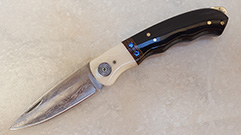 KNIFE ENGRAVED STEEL HANDLE CAMEL AND BUFFALO BONE 18.5 CM
